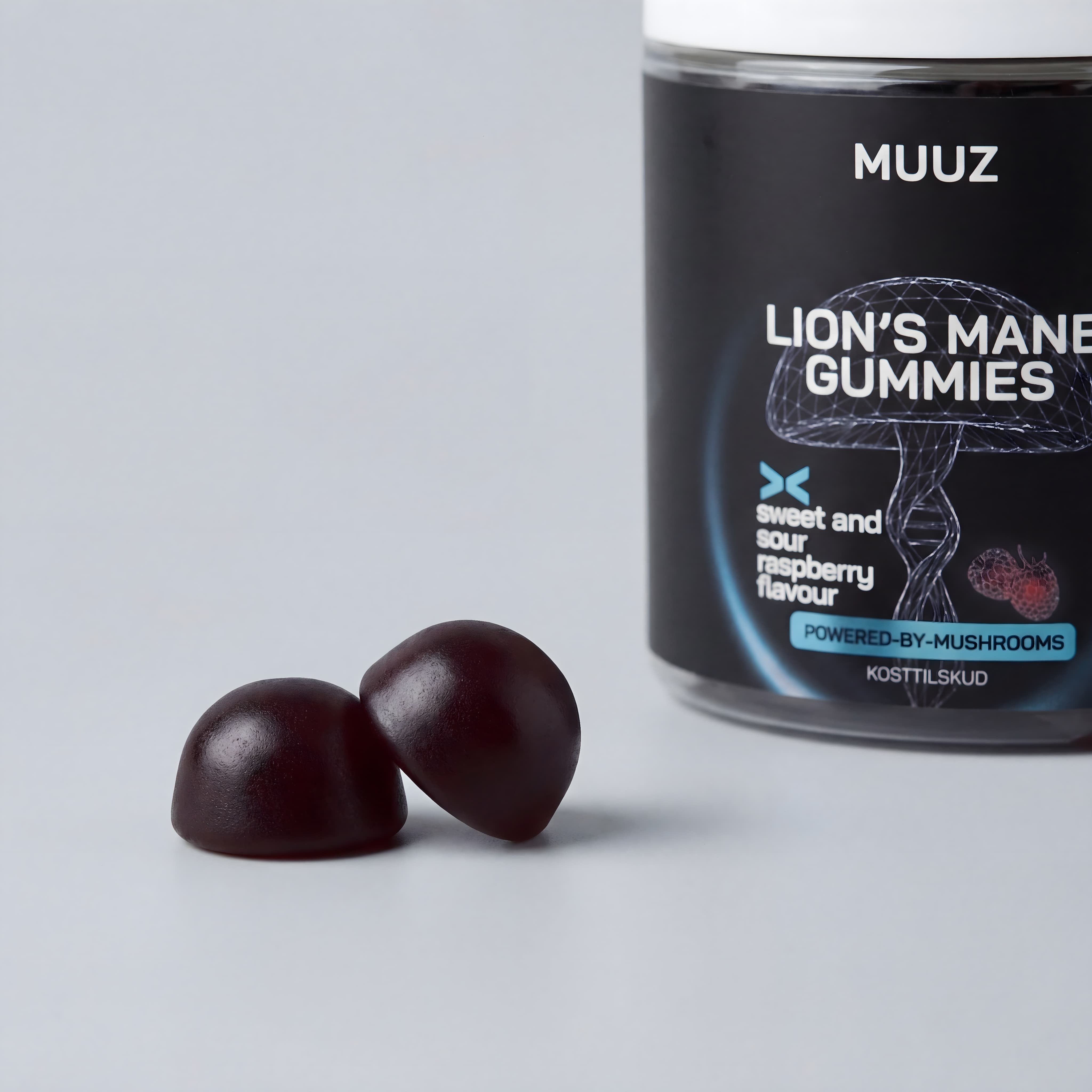 MUUZ Lion’s Mane Gummies kosttilskud med gummies på lys grå baggrund